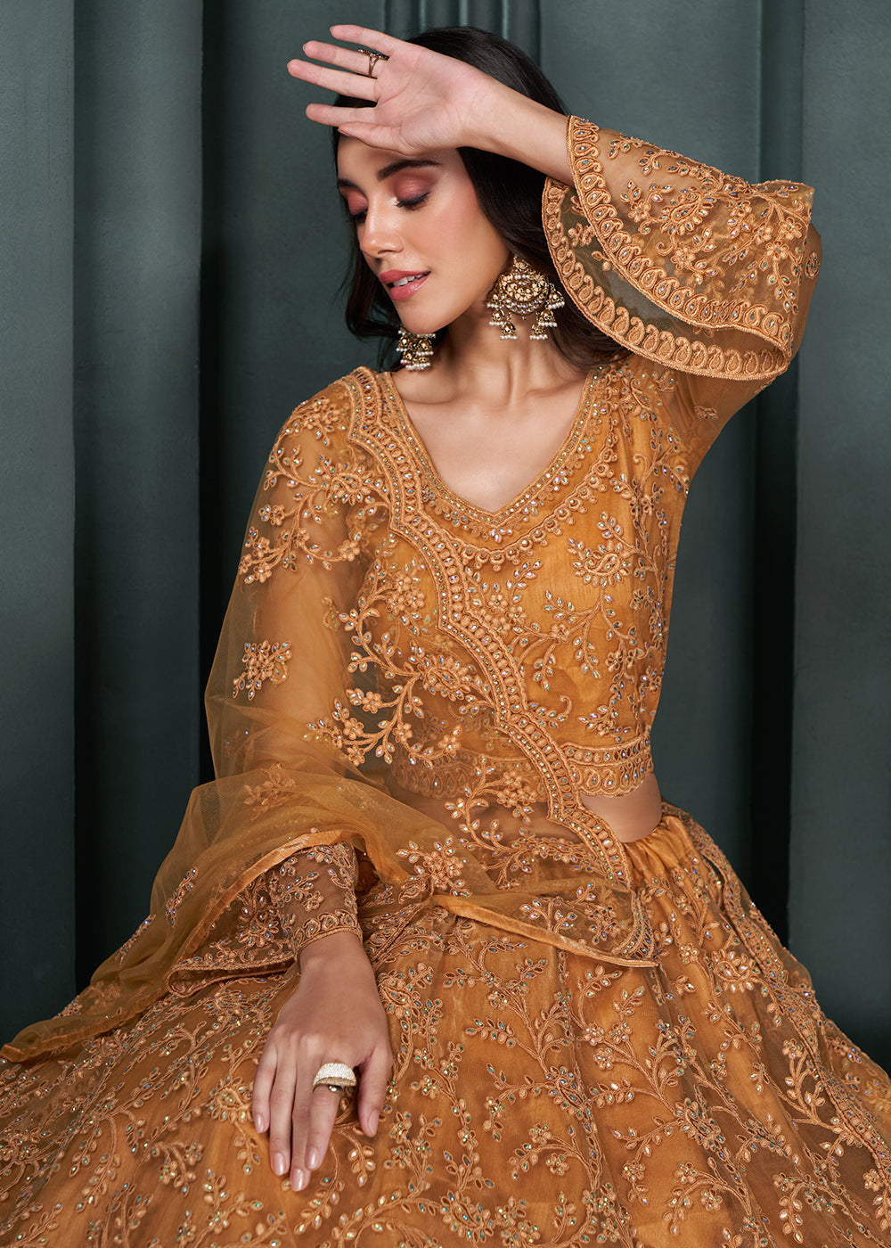Copper Brown Net Lehenga Choli Beautifully Embroidered with Thread, Badla work & all Over Embellishments Stone work