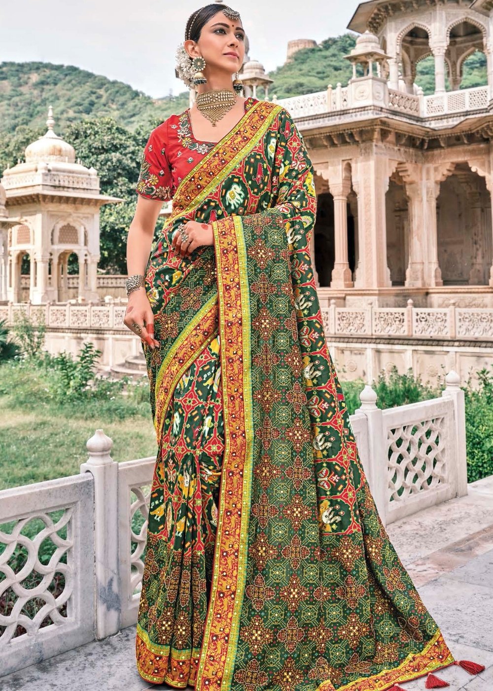 Pine Green Bandhej Patola Silk Saree with Embroidered Blouse
