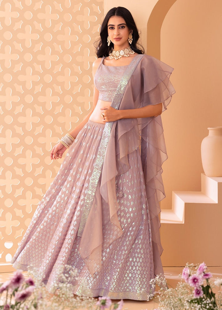 Nude Pink Georgette Lehenga Choli With Sequins And Thread Embroidered Work