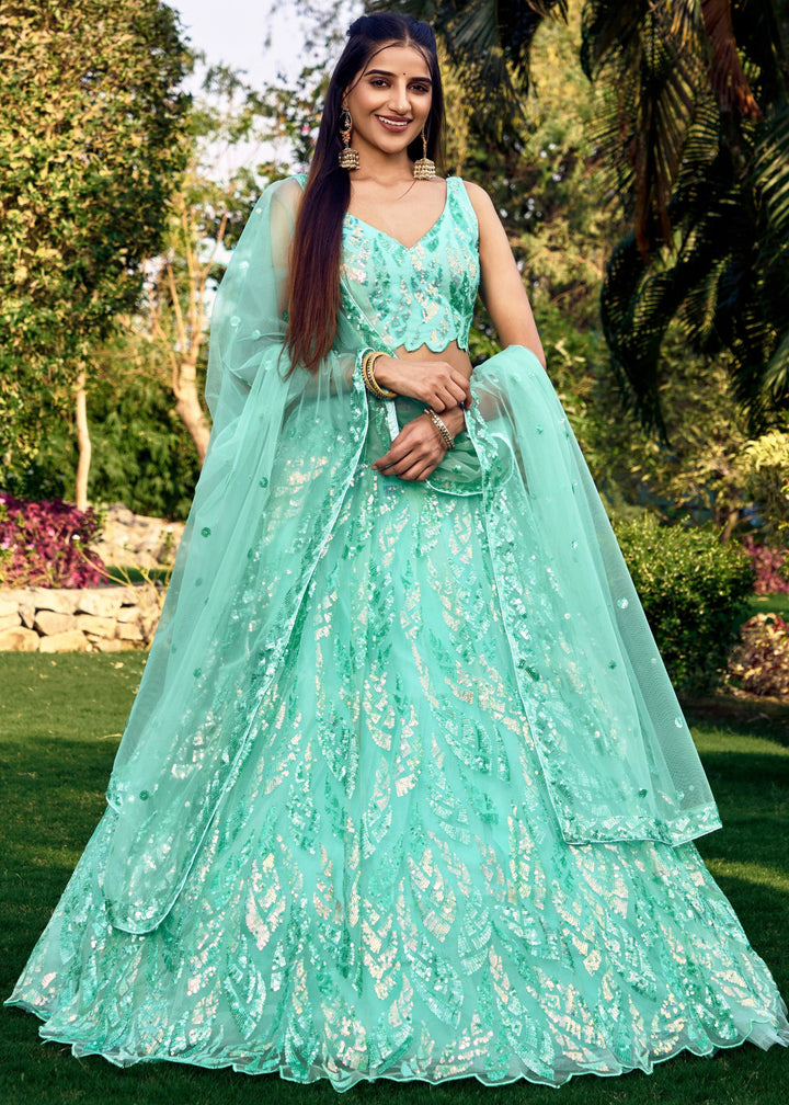 Aqua Blue Net Lehenga Choli With Multiple Sequins And Thread Embroidery Work