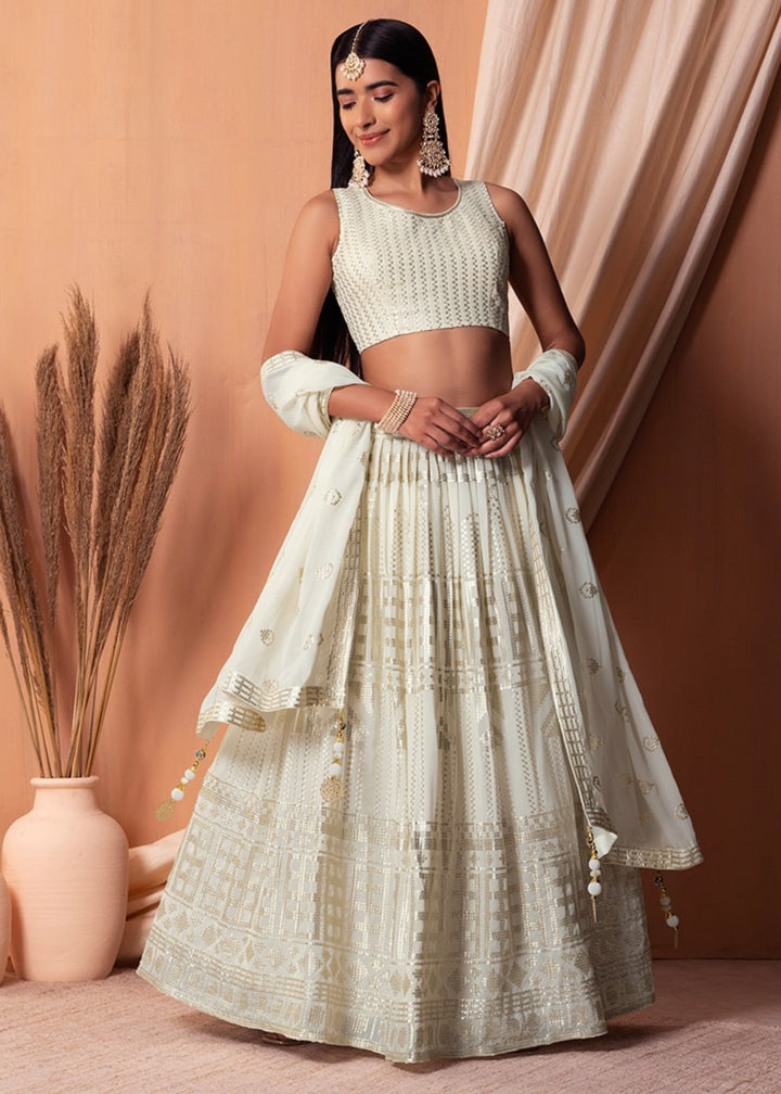 Off White Georgette Lehenga Choli With Sequins And Thread Embroidery Work