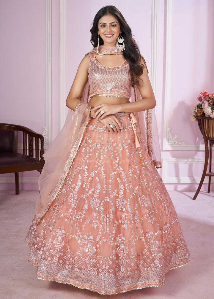 Peach Pink Net Lehenga Choli With Sequins And Thread Embroidery Work