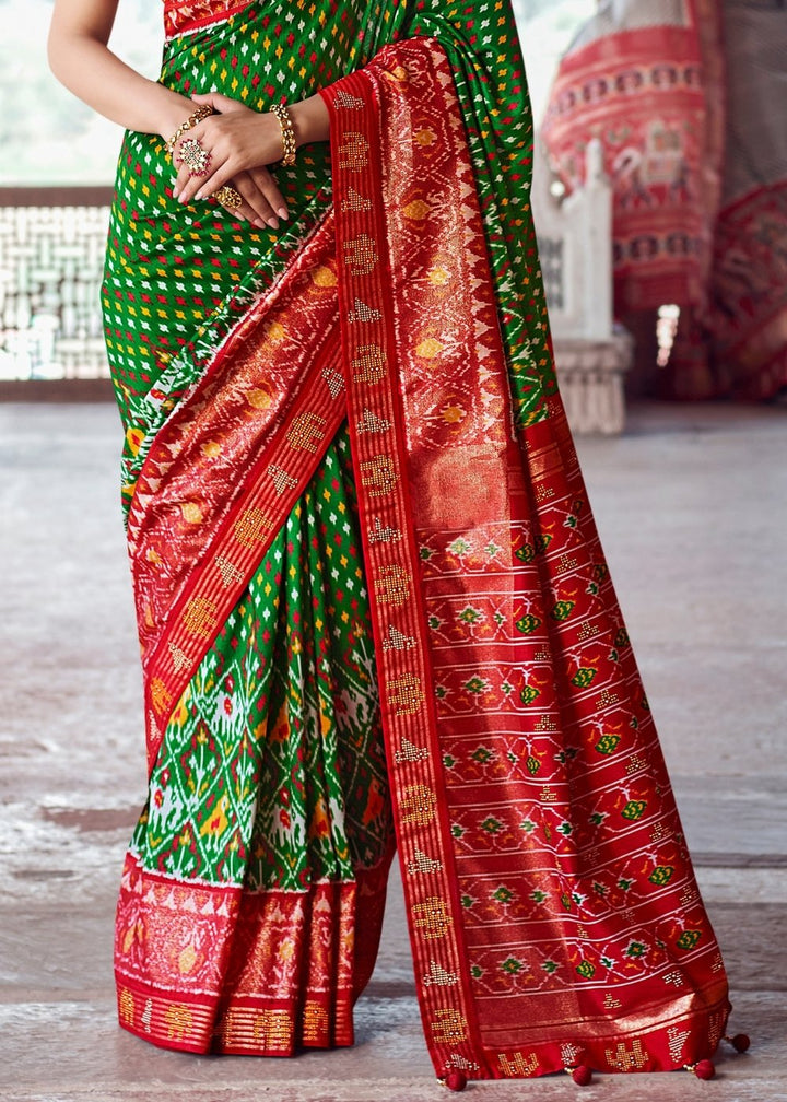 Kelly Green & Red Patola Silk Saree with Zari Border Pallu & Stone work