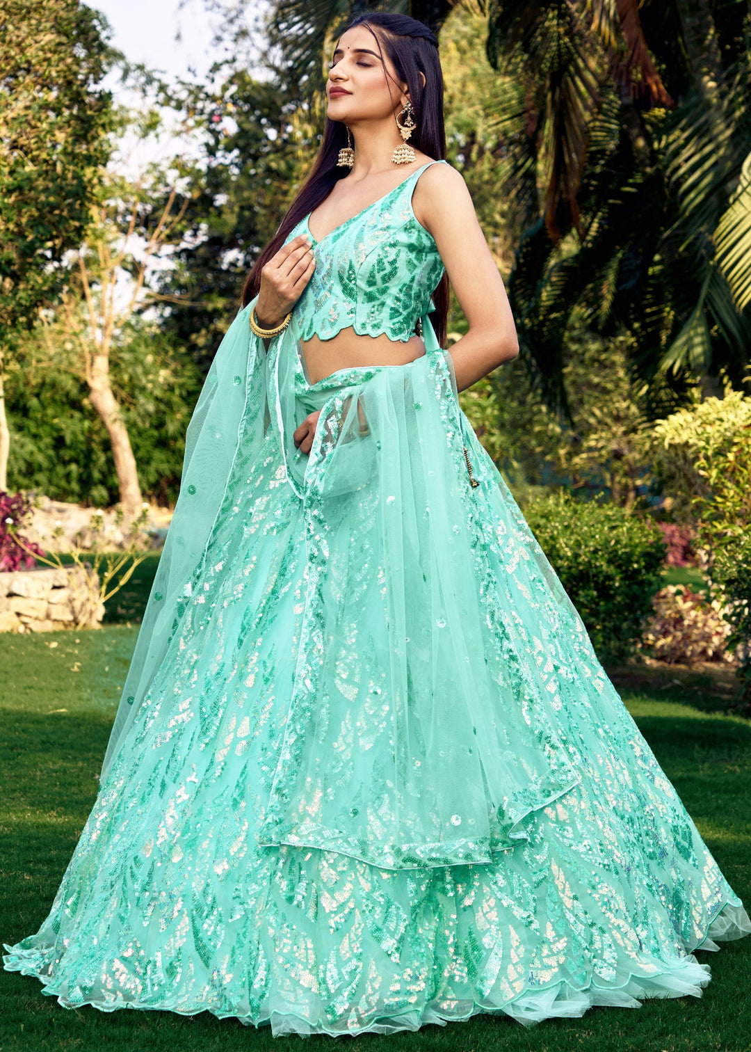 Aqua Blue Net Lehenga Choli With Multiple Sequins And Thread Embroidery Work