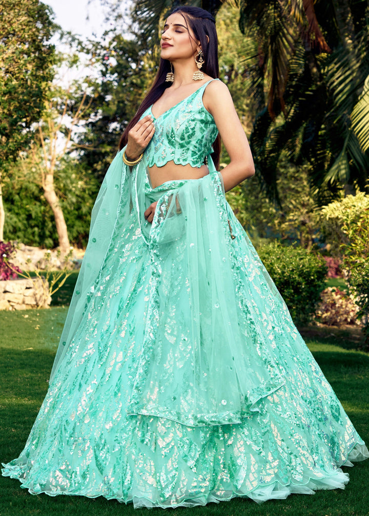 Aqua Blue Net Lehenga Choli With Multiple Sequins And Thread Embroidery Work