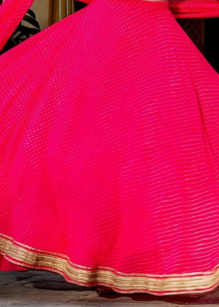 Hot Pink Georgette Leheriya Print Lehenga With Zari And Lace Work