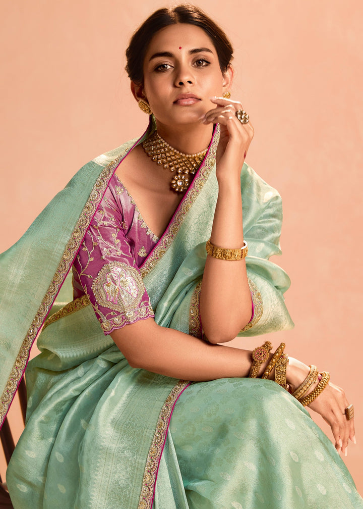 Mint Green Zari Tissue Silk Saree With Weaving Work And Heavy Embroidery Lace
