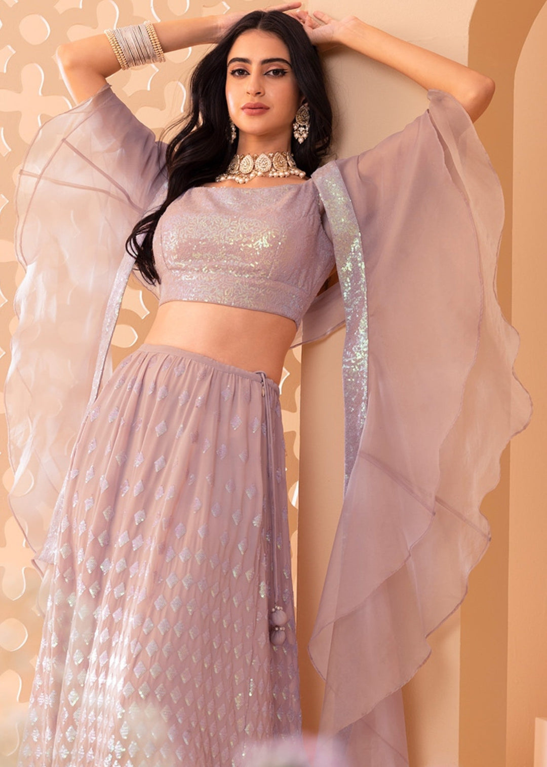 Nude Pink Georgette Lehenga Choli With Sequins And Thread Embroidered Work