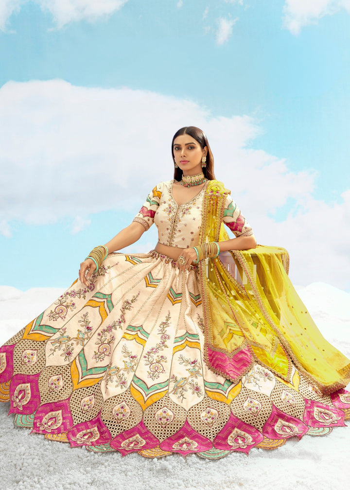 Off-White And Yellow Silk Lehenga With Cut Work Border