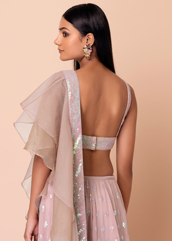 Nude Pink Georgette Lehenga Choli With Sequins And Thread Embroidered Work