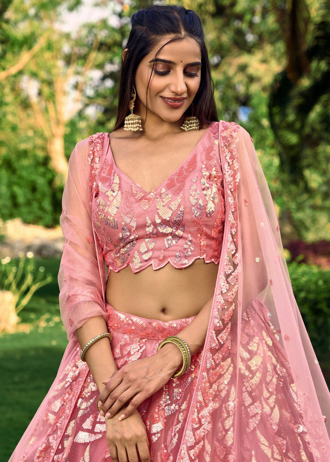 Baby Pink Net Lehenga Choli With Multiple Sequins And Thread Embroidery Work