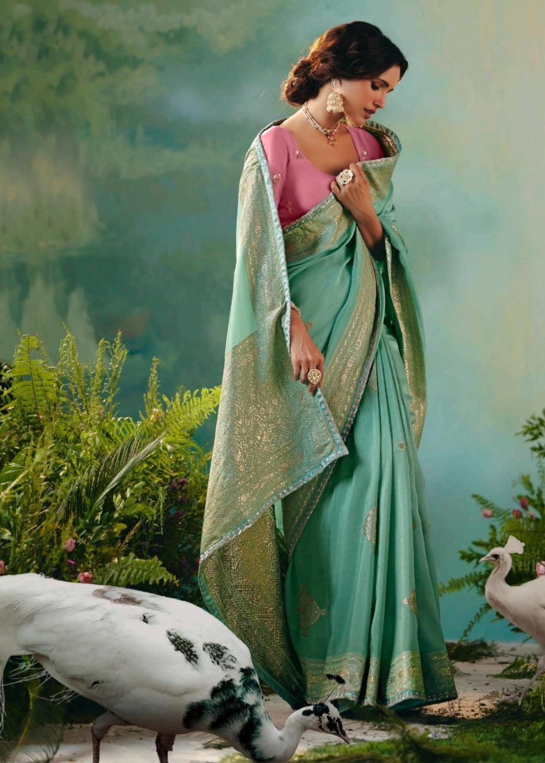 Sea Green Pure Viscose Dola Silk Saree with Zari Weaving & Embroidered Blouse