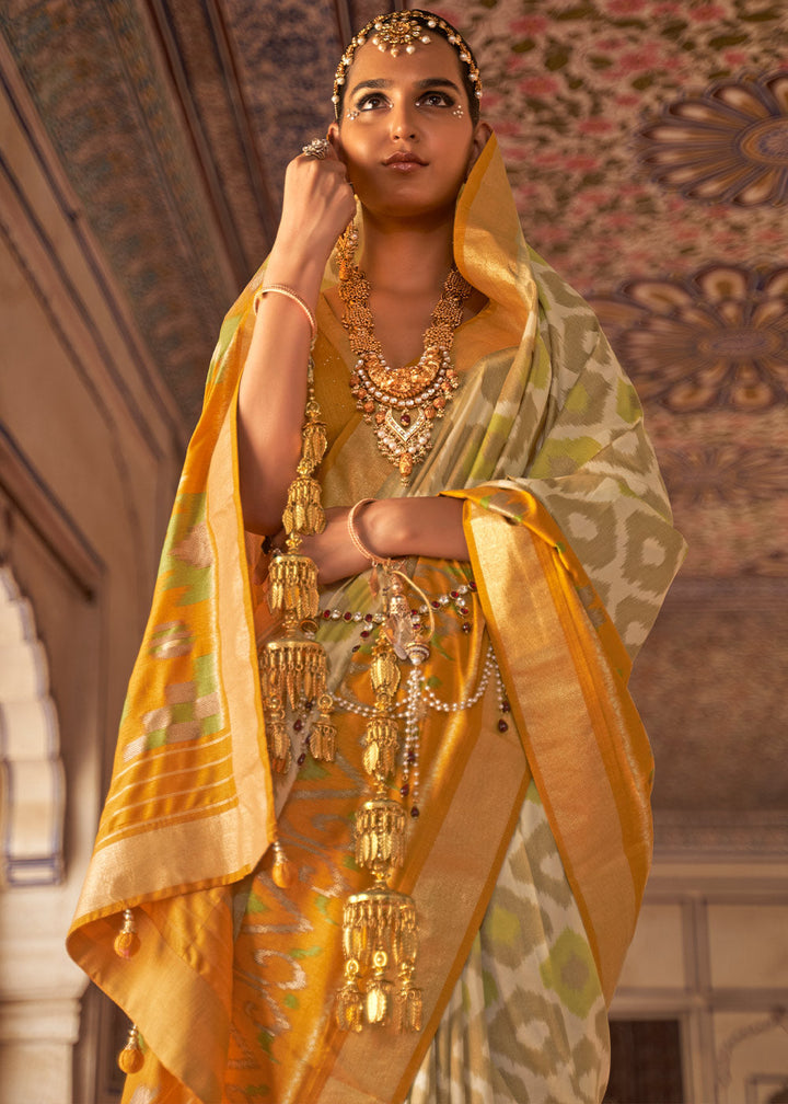 Cream & Yellow Printed Patola Dola Silk Saree with Zari Border
