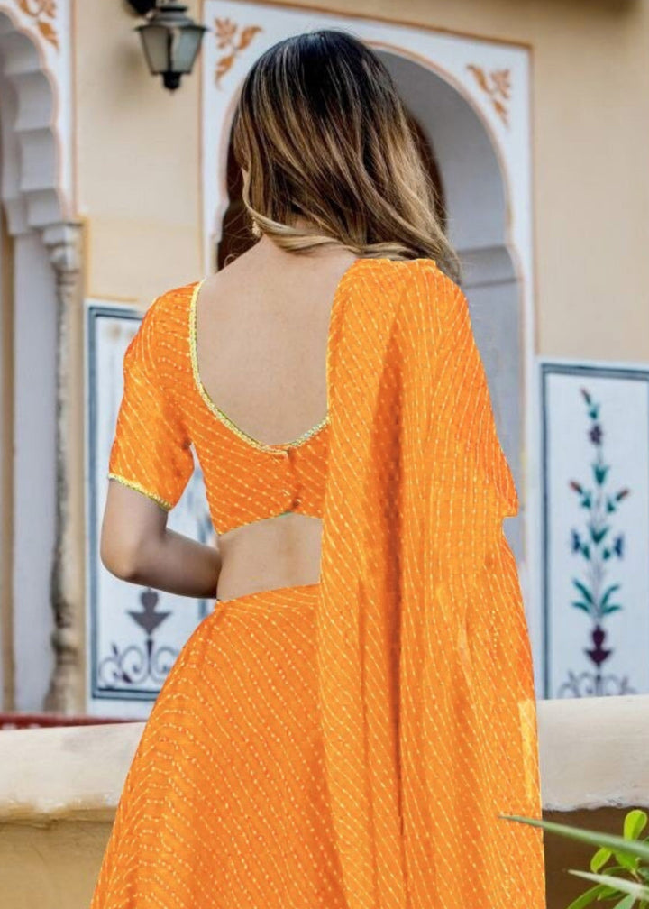 Tang Orange Georgette Leheriya Print Lehenga With Zari And Lace Work