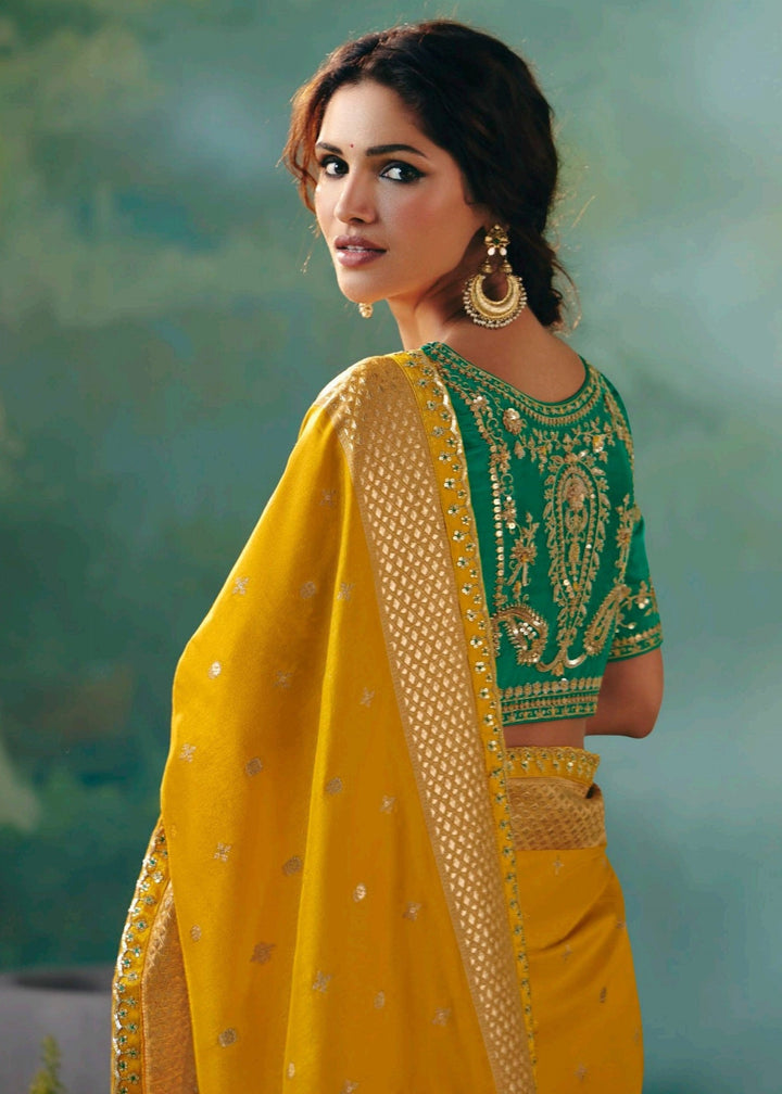 Golden Yellow Pure Viscose Dola Silk Saree with Zari Weaving & Embroidered Blouse