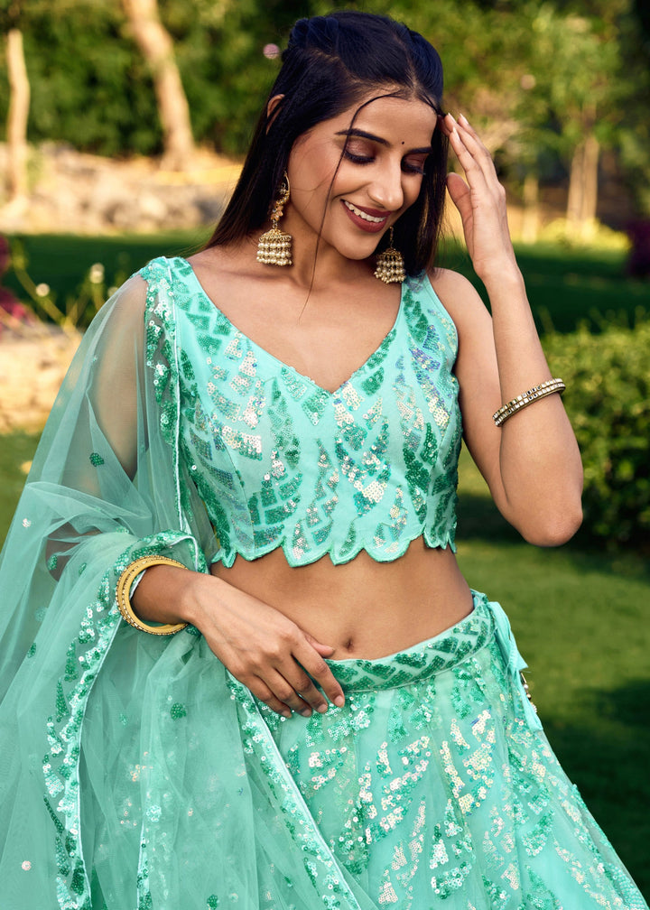 Aqua Blue Net Lehenga Choli With Multiple Sequins And Thread Embroidery Work