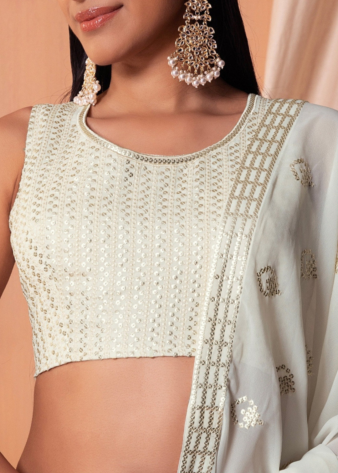 Off White Georgette Lehenga Choli With Sequins And Thread Embroidery Work