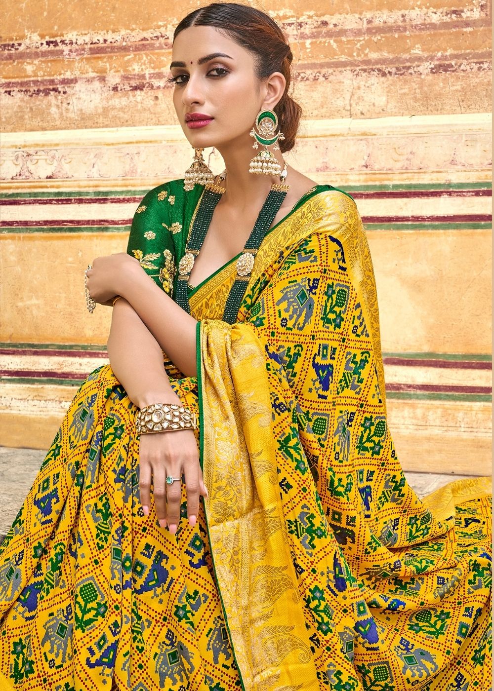 Yellow Patola Printed Silk Saree with Heavy Embroidery Border