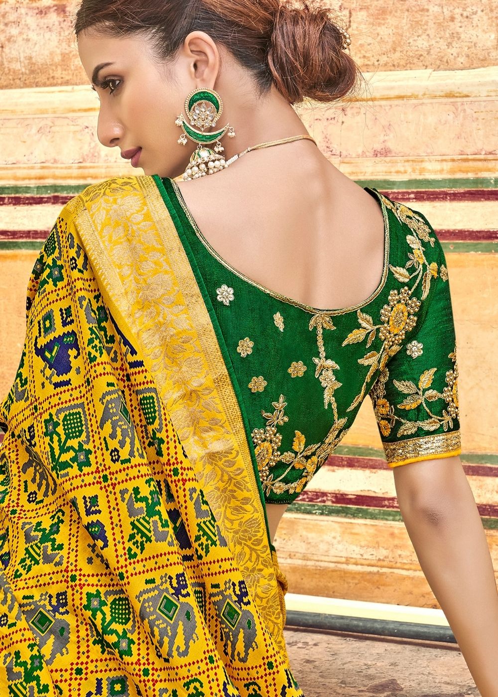 Yellow Patola Printed Silk Saree with Heavy Embroidery Border