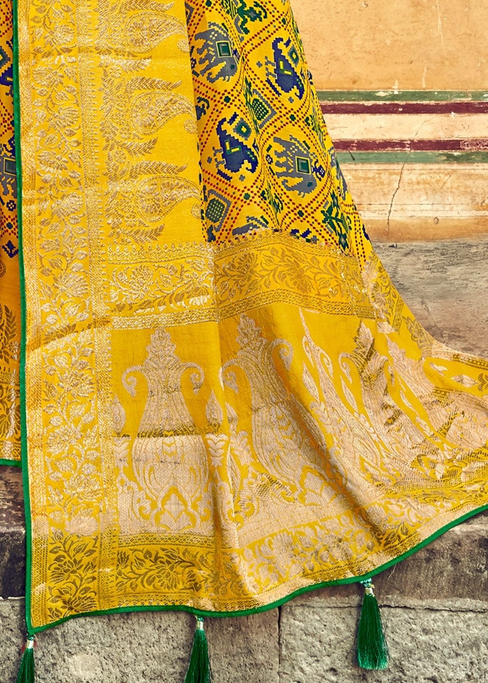 Yellow Patola Printed Silk Saree with Heavy Embroidery Border